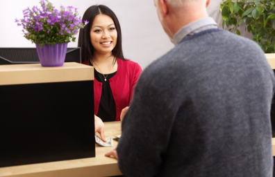 Bank Teller Dispensing Cash